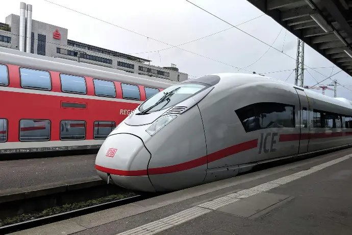 silver and red bullet train